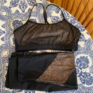 Fabletics yoga pants sports bra set. Black and gold glitter shimmer. Large